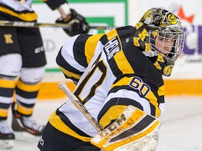 Kingston Frontenacs goalie Jeremy Helvig, in action last season against the Ottawa 67’s, returned to the OHL team from the Carolina Hurricanes rookie camp on Tuesday. (Wayne Cuddington/Postmedia Network file photo)