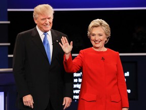 Republican presidential nominee Donald Trump and Democratic presidential nominee Hillary Clinton are introduced during the presidential debate at Hofstra University in Hempstead, N.Y., Monday, Sept. 26, 2016. (AP Photo/David Goldman)