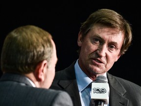 NHL commissioner Gary Bettman and hockey icon Wayne Gretzky unveil the league's centennial celebration plansduring a press conference at the World Cup of Hockey at the Air Canada Centre on Sept. 27, 2016. (Minas Panagiotakis/Getty Images)