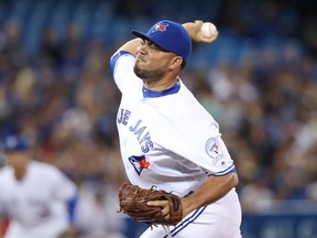 Joaquin Benoit of the Toronto Blue Jays delivers a pitch in the seventh inning during MLB game action against the Tampa Bay Rays on Sept. 12, 2016 at Rogers Centre. (Tom Szczerbowski/Getty Images)