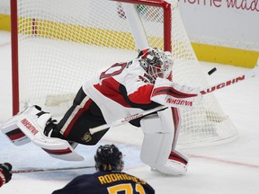 Senators goalie Andrew Hammond makes a stick save during the second period of Ottawa’s pre-season game against the Sabres on Tuesday night in Buffalo. (THE ASSOCIATED PRESS/PHOTO)