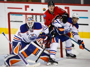 Jonas Gustavsson made a good first impression in his first audition with the Oilers Monday, pitching 30 shutout minutes against the Flames. (The Canadian Press)