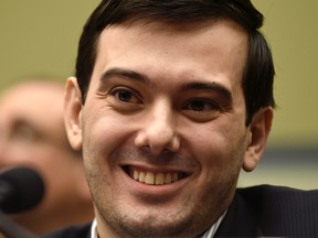 In this Feb. 4, 2016 file photo, Pharmaceutical chief Martin Shkreli smiles on Capitol Hill in Washington during the House Committee on Oversight and Reform Committee hearing on his former company's decision to raise the price of a lifesaving medicine. (AP Photo/Susan Walsh, File)