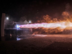 This Sept. 25, 2016 photo made available by SpaceX shows a test firing of the company's Raptor engine in McGregor, Texas. On Tuesday, Sept. 27, 2016, SpaceX founder Elon Musk announced his company's plan for travel to the planet Mars. The engine is being tested for use in the new spacecraft. (SpaceX via AP)