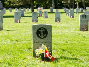 The graves of veterans in the Maitland Cemetery are adorned with Canadian flags on Decoration Day in recognition of their sacrifices. (Darryl Coote/The Goderich Signal Star)