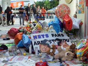 Items sit at a makeshift memorial in memory of Marlins pitcher Jose Fernandez outside Marlins Park in Miami on Tuesday, Sept. 27, 2016. (Lynne Sladky/AP Photo)