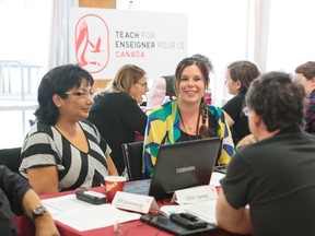 Sarnia native Caralee Pattyson-Talbot, centre, has just started her second year of teaching in Kitchenuhmaykoosib Inninuwug First Nation, a fly-in community 600 kilometres north of Thunder Bay. The Grade 8 teacher got her assignment through Teach for Canada, a new non-profit that matches teachers with northern Ontario First Nations communities often in desperate need of educators for their schools. (Handout/Sarnia Observer/Postmedia Network)