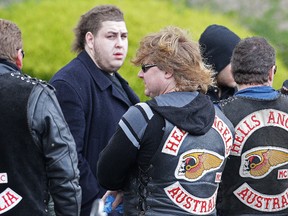 Omar Chaouk, second from left, the son of Macchour Chaouk talks to Hells Angels bikers after the funeral for Melbourne crime figure Macchour Chaouk at Preston Mosque on August 16, 2010 in Melbourne, Australia.  (Getty Images)