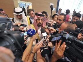 Khalid Al-Falih Minister of Energy, Industry and Mineral Resources of Saudi Arabia answers questions as part of the 15th International Energy Forum Ministerial meeting in Algiers, Algeria, Tuesday, Sept. 27, 2016. At meetings in Algeria this week, energy ministers from OPEC and other oil-producing countries are discussing whether to freeze production levels to boost global oil prices. (AP Photo/ Sidali Djarboub)