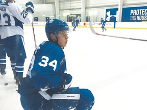 Toronto Maple Leafs rookie Auston Matthews takes a knee during training camp at the MasterCard Centre in Toronto on Sept. 28, 2016. (Terry Koshan/Postmedia)