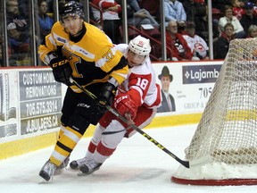 Kingston Frontenacs defenceman Stephen Desrocher tries to fend off Soo Greyhounds forward Blake Speers during an OHL game in Sault Ste. Marie last season. Desrocher has returned to the Frontenacs from the Toronto Maple Leafs NHL camp. (Jeffrey Ougler/Postmedia Network)