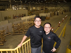Hanwha president Michael Kim (left) and CFO/controller Sam Sim are happy that the plant is expanding in London, Ont. on Wednesday September 28, 2016. (DEREK RUTTAN, The London Free Press)