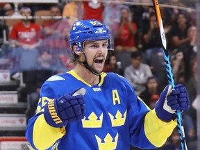 Erik Karlsson of Team Sweden celebrates his third period goal against Team Europe at the semifinal game during the World Cup of Hockey at the Air Canada Centre on Sept. 25, 2016 in Toronto, Canada. (Bruce Bennett/Getty Images)