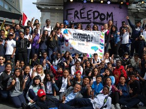Avi Benlolo with St. Angela Catholic School group at a Freedom Day event at Dundas Square in Toronto Sept. 28, 2016. (Supplied)