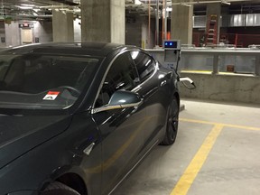 EEDC president Brad Ferguson charges his electric car at Rogers Place. Elise Stolte/Postmedia