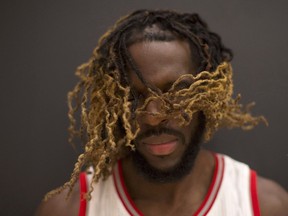 Toronto Raptors forward DeMarre Carroll shakes his head during a photo shoot at a media day event for the team in Toronto on Sept. 26, 2016. (THE CANADIAN PRESS/Chris Young)