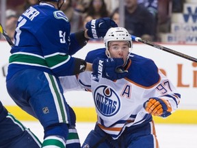 Connor McDavid was back in Oilers uniform Wednesday for the first time since returning from the World Cup of Hockey, centring the first line against the Canucks in Vancouver. (The Canadian Press)