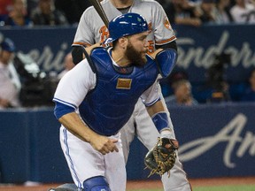 The Blue Jays are headed back to Montreal for a pair of pre-season games. Catcher Russell Martin was born in Toronto but grew up in Montreal. (STAN BEHAL/PHOTO)