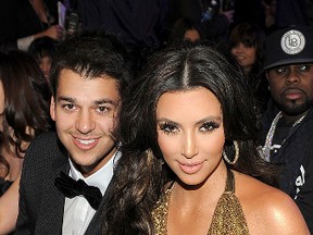 TV Personalities Rob and Kim Kardashian attend The 53rd Annual GRAMMY Awards held at Staples Center on February 13, 2011 in Los Angeles, California. (Photo by Larry Busacca/Getty Images For The Recording Academy)