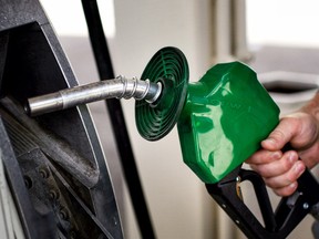 A customer fills up their car at a BP gas station in South Minneapolis, Min., in this Sept. 4, 2015 file photo. (Glen Stubbe/Star Tribune via AP)