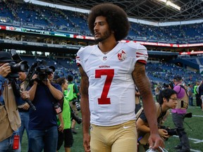 A bar in Florida has set up a urinal that contains a decal of 49ers quarterback Colin Kaepernick's uniform that patrons can urinate on. (Otto Greule Jr/Getty Images)