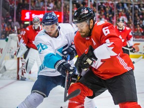 Team Canada defenceman Shea Weber and Team Europe forward Thomas Vanek in action during the second period in Game 1 of the World Cup of Hockey Final at the Air Canada Centre in Toronto on Tuesday, Sept. 27, 2016. (Ernest Doroszuk/Toronto Sun)