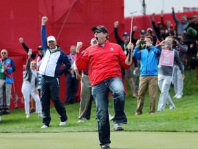 Fan David Johnson of North Dakota reacts after being pulled from the crowd and making a putt on the eighth green during practice prior to the 2016 Ryder Cup at Hazeltine National Golf Club in Chaska, Minn., on Thursday, Sept. 29, 2016 (David Cannon/Getty Images)