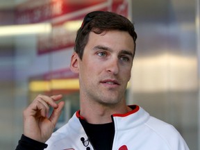 Four-time Olympic speedskating medalist Denny Morrison talks with media at Calgary's Olympic Oval on May 3, 2016 after he suffered a stroke in Salt Lake City on April 23. (Leah Hennel/Postmedia Network)