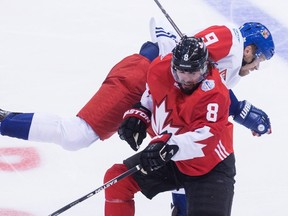 Team Canada's Drew Doughty checks the Czech Republic's Milan Michalek during World Cup of Hockey action in Toronto on Sept. 17, 2016. (THE CANADIAN PRESS/Chris Young)