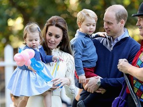 Catherine, Duchess of Cambridge holding Princess Charlotte of Cambridge and Prince George of Cambridge, being held by Prince William, Duke of Cambridge at a children's party for Military families during the Royal Tour of Canada on Sept. 29, 2016 in Victoria, B.C. (Photo by Chris Jackson - Pool/Getty Images)
