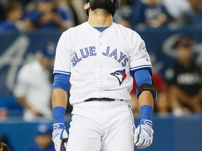 Jose Bautista strikes out in the fourth inning as the Blue Jays play the Baltimore Orioles at the Rogers Centre in Toronto on Sept. 27, 2016. (Stan Behal/Toronto Sun/Postmedia Network)