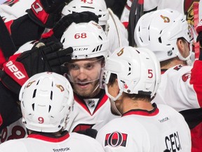 Ottawa Senators' Mike Hoffman celebrates with teammates after scoring against the Montreal Canadiens during overtime period NHL pre-season action in Montreal on Sept. 29, 2016. (THE CANADIAN PRESS/Graham Hughes)