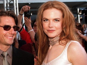FILE - Picture taken November 7, 1999 shows actors Tom Cruise (L) and his then Australian wife, Nicole Kidman arriving at the official opening of Fox Studios Australia in Sydney. (TORSTEN BLACKWOOD/AFP/Getty Images)