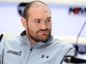 Tyson Fury looks on during Tyson Fury and Wladimir Klitschko head to head press conference on April 28, 2016 in Cologne, Germany. Fury v Klitschko Part 2 will take place in Manchester on July 9 for the WBO, WBA and IBO heavyweight belts. (Photo by Sascha Steinbach/Bongarts/Getty Images)
