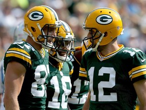 Jordy Nelson and Aaron Rodgers of the Green Bay Packers celebrate after scoring a touchdown in the first quarter against the Detroit Lions at Lambeau Field on September 25, 2016 in Green Bay, Wisconsin. (Dylan Buell/Getty Images)