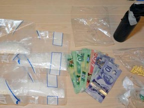 Approximately $6,500 in cocaine and crystal methamphetamine seized by the Kingston Police Thursday afternoon on Eldon Hall Place in Kingston, Ont. Photo supplied by the Kingston Police