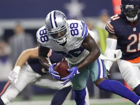Cowboys receiver Dez Bryant should miss some time with a hairline fracture in his knee. (GETTY IMAGES)