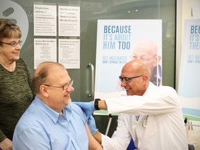 Health Minister Kelvin Goertzen received his flu shot on Friday at a pharmacy in Steinbach. (MANITOBA GOVERNMENT PHOTO)