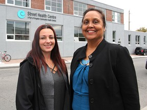 Violet Acevedo, left, manager of the Street Health Centre, and Hersh Sehdev, executive director of the Kingston Community Health Centres, stand in front of the Street Health Centre in Kingston, Ont. on Friday, Sept. 30, 2016, which officially opened Friday. Michael Lea The Whig-Standard
