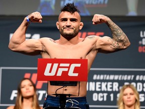 John Lineker of Brazil steps onto the scale during the UFC Fight Night weigh-in at the Oregon Convention Center on Sept. 30, 2016 in Portland, Oregon. (Josh Hedges/Zuffa LLC/Zuffa LLC via Getty Images)
