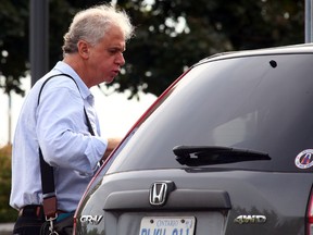 Restaurateur George Foulidis is pictured leaving his Tuggs restaurant  in the eastern beaches on Sept. 28. (DAVE ABEL, Toronto Sun)