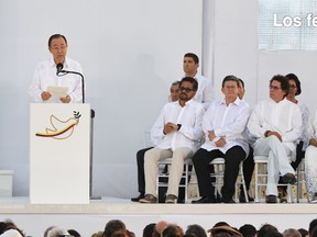 The Secretary General of the United Nations, Ban Ki-moon, delivers a speech after Colombian president Juan Manuel Santos and the leader of the FARC, Rodrigo Londono - better known by his nom de guerre, Timoleon 'Timochenko' Jimenez - signed the historic peace agreement between the Colombian government and the Revolutionary Armed Forces of Colombia (FARC), in Cartagena, Colombia, on September 26, 2016. (LUIS ACOSTA/AFP/Getty Images)