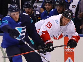 Leon Draisaitl, left, of Team Europe gets tied up with Ryan Getzlaf of Team Canada during the first period during Game Two of the World Cup of Hockey final series at the Air Canada Centre on September 29, 2016 in Toronto, Canada.