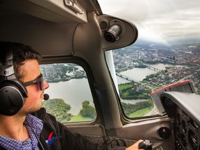 Adam Hicks of the Ottawa Flying Club was flying over Ottawa during its Annual Fly Day event.