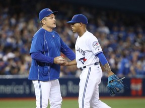 Marcus Stroman of the Toronto Blue Jays exits the game as he is relieved by manager John Gibbons #5 in the eighth inning during MLB game action against the Baltimore Orioles on September 29, 2016 at Rogers Centre in Toronto, Ontario, Canada. (Tom Szczerbowski/Getty Images)