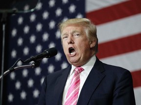 Republican presidential candidate Donald Trump speaks at a rally, Saturday, Oct. 1, 2016, in Manheim, Pa. (AP Photo/John Locher)