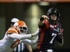 Redblacks QB Trevor Harris throws a pass against the B.C. Lions on Oct. 1. (The Canadian Press)