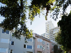 In this photo taken Wednesday, Sept. 21, 2016, traffic makes its way down Lombard Street, also known as the "most crooked street" in San Francisco. The crooked block has become so chaotic that the city of San Francisco is considering solutions as drastic as banning cars, requiring reservations or charging a toll to the cars wishing to drive down the stretch of winding street to try to bring order to one of the world's most famous streets. (AP Photo/Eric Risberg)