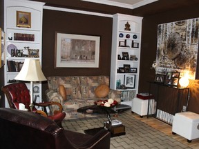 A living room inside the Skilbeck Cottage. Owner Gerry Legault has modernized the home to suit his tastes, but he's preserved the historic architectural features. (Barbara Simpson/Sarnia Observer)