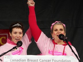 Jennifer Gagnon, left, and Sandra Joyce share their story at the CIBC Run for the Cure at St. Lawrence College on Sunday. (Steph Crosier/The Whig-Standard)